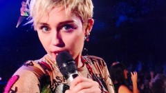 Miley Cyrus takes a selfie on stage at the Adelaide Entertainment Centre